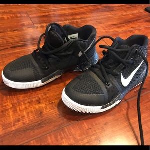 Niki high top sneaker.